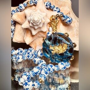 DRAGON HEAD IN BLUE FLOWERS NECKLACE